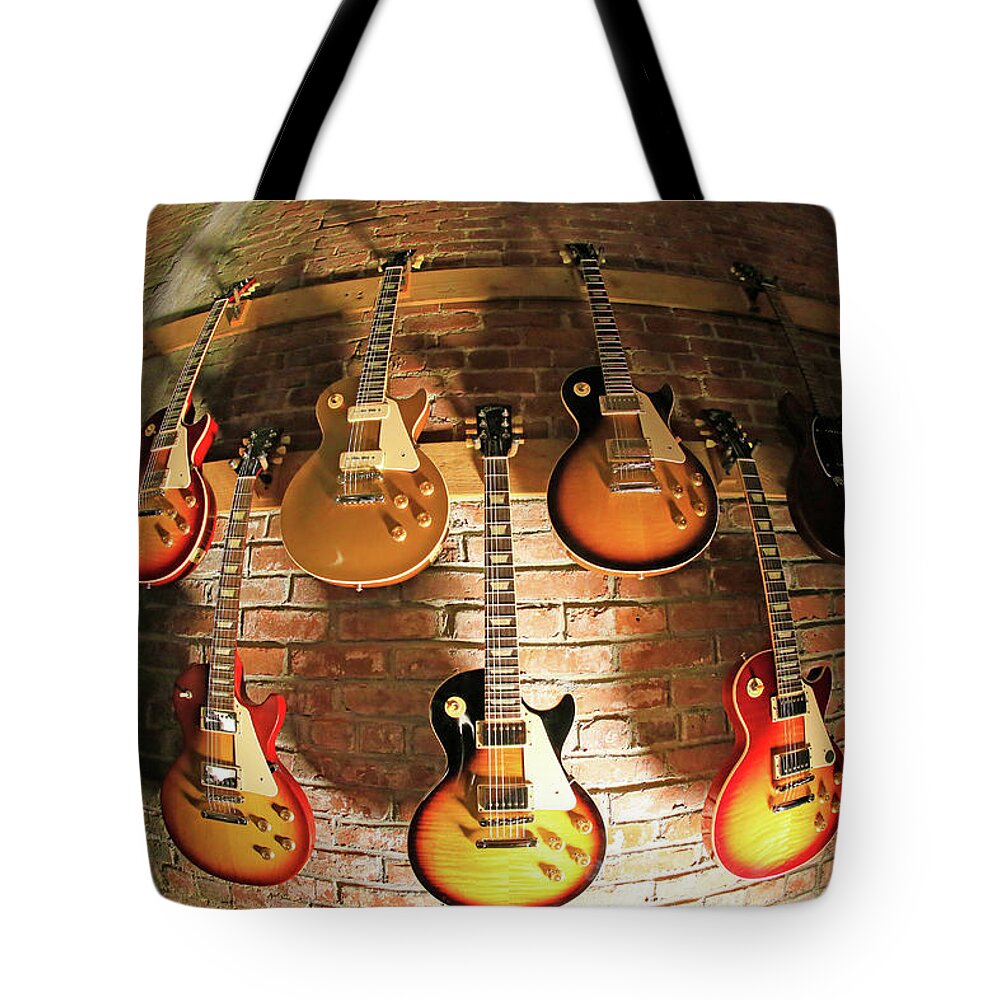Gibson Tote Bag featuring the photograph Les Paul Wall by Shoal Hollingsworth