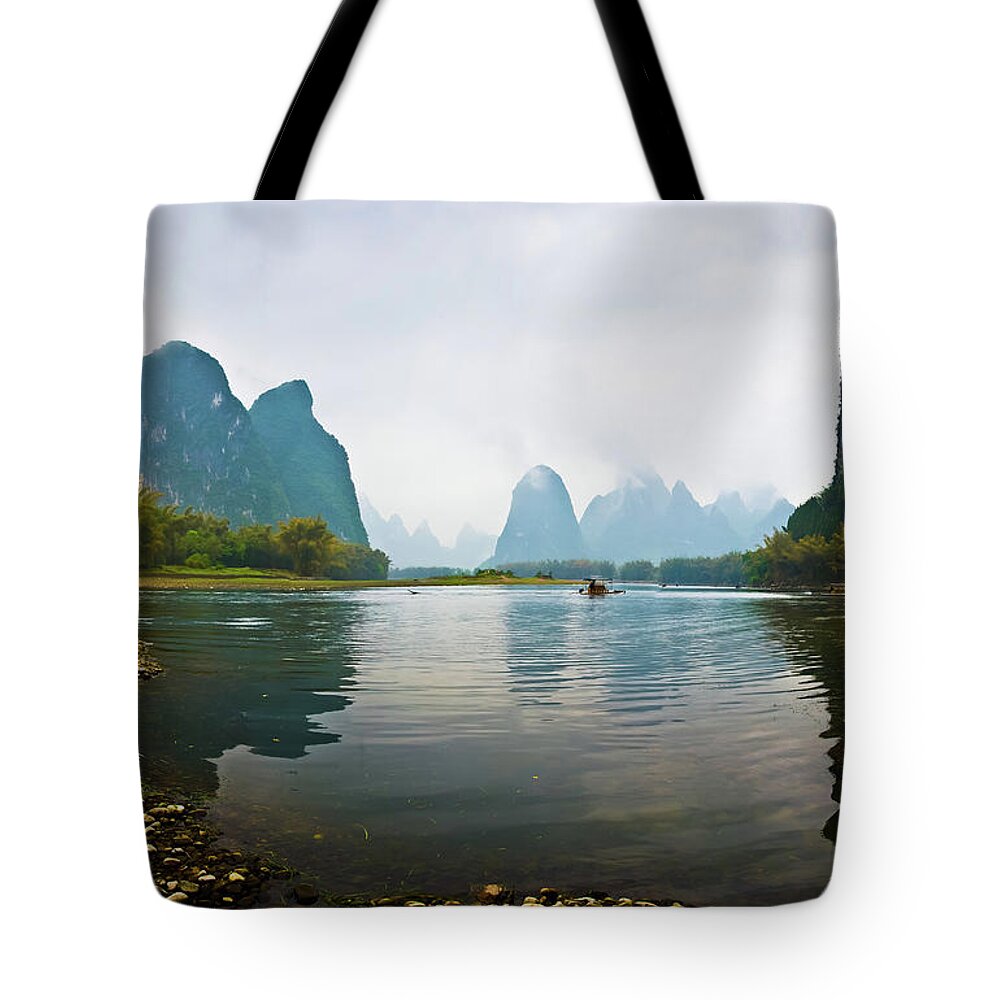 Tranquility Tote Bag featuring the photograph Li River Of Guilin by Zhouyousifang