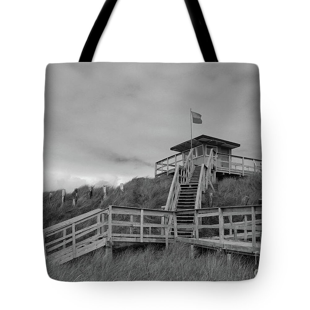Blue Flag Tote Bag featuring the photograph Lifeguard Station Rossnowlagh Donegal 2 bw by Eddie Barron