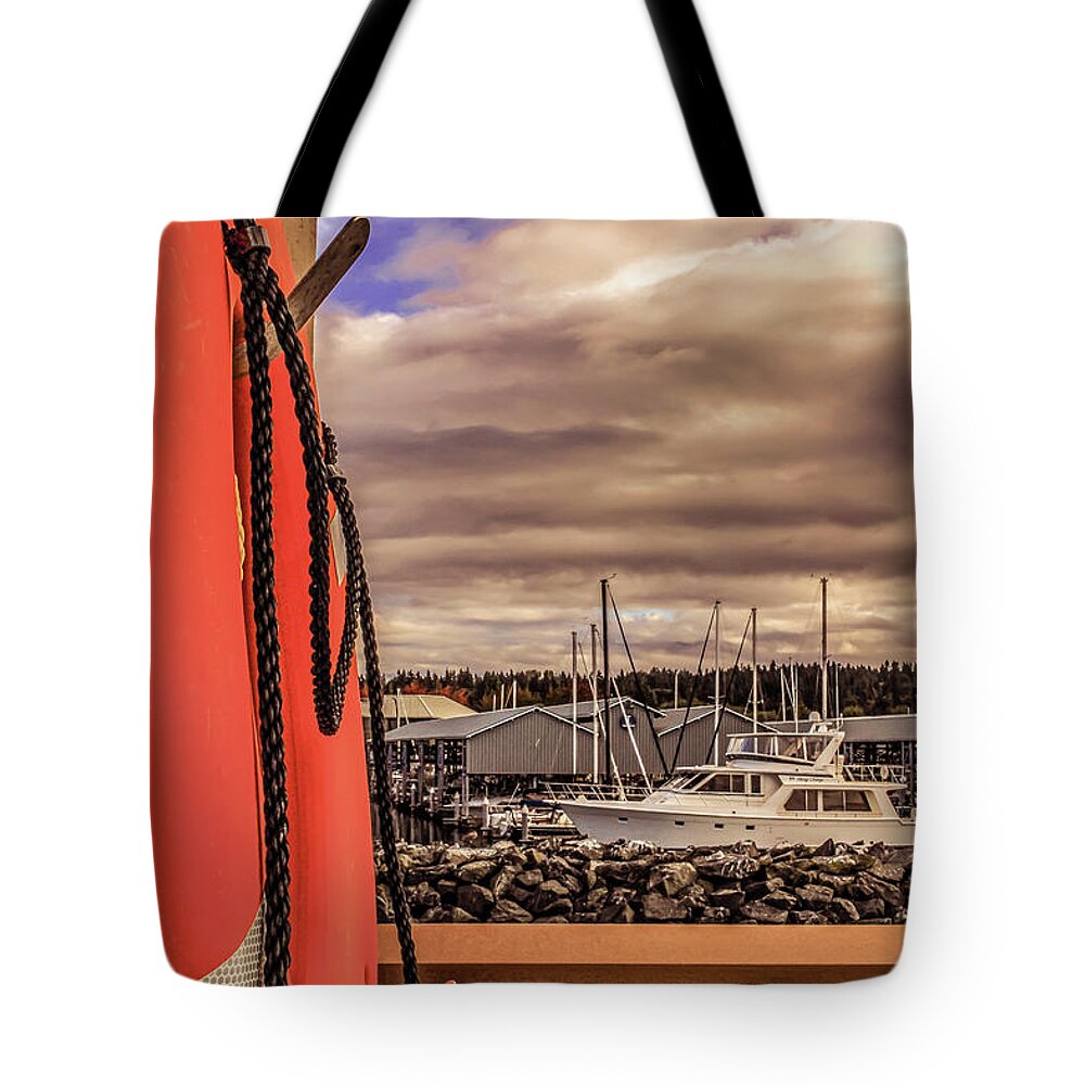 Lifesaver Tote Bag featuring the photograph Lifesaver in Edmonds Beach by Anamar Pictures