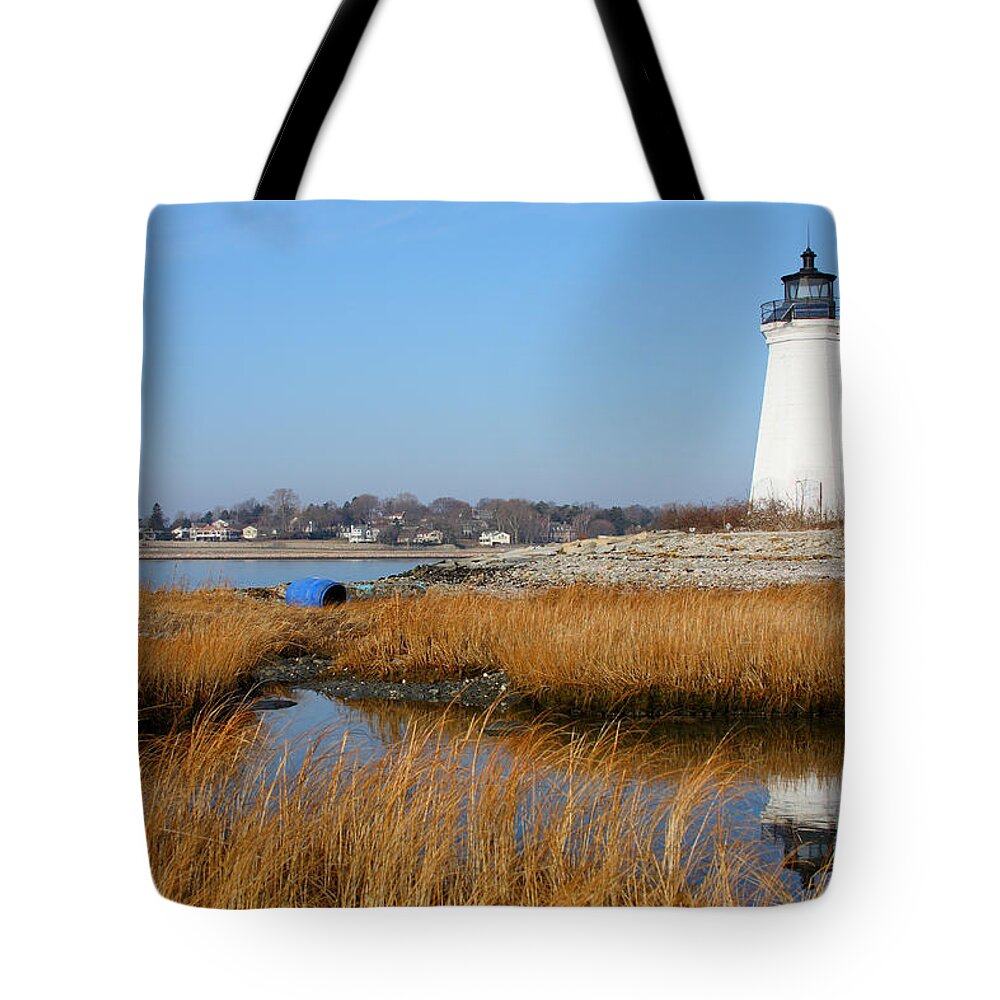 Water's Edge Tote Bag featuring the photograph Lighthouse by Denistangneyjr