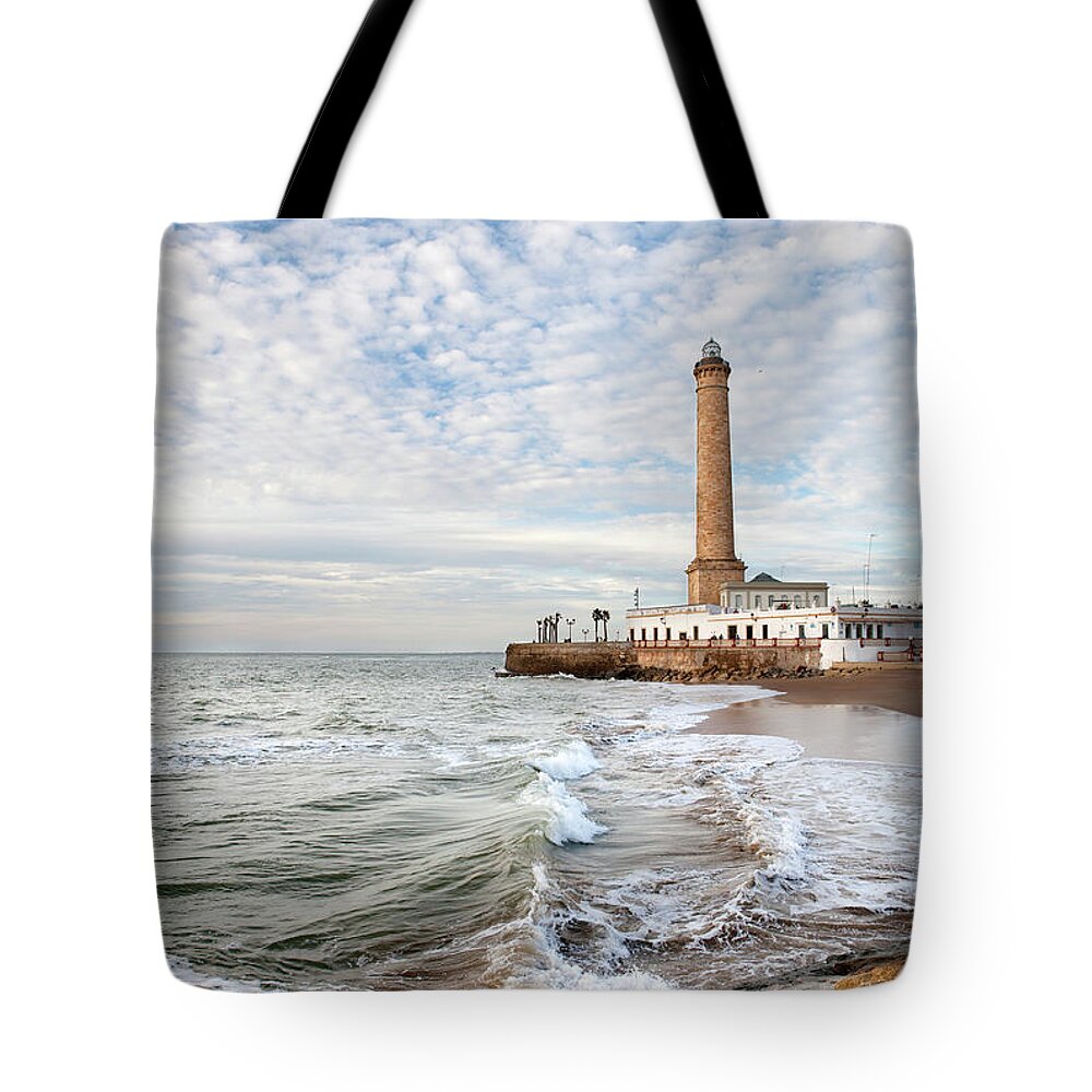 Transfer Print Tote Bag featuring the photograph Lighthouse Of Chipiona by An Image Is Forever