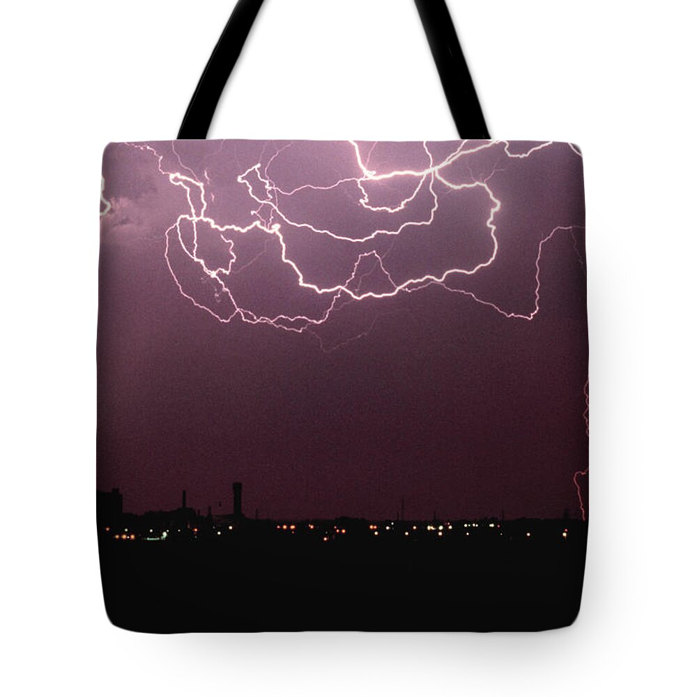 Thunderstorm Tote Bag featuring the photograph Lightning Over City by John Foxx