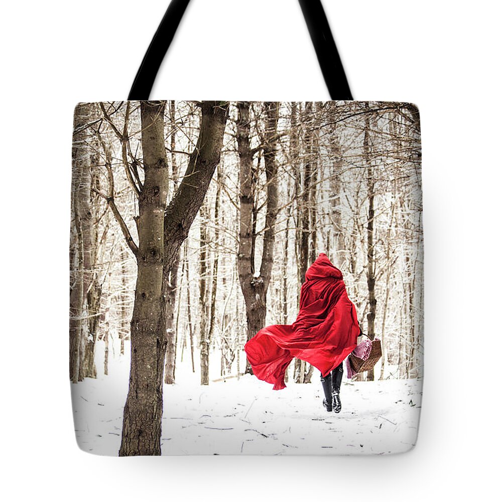 Little Red Riding Hood Tote Bag featuring the photograph Little Red Riding Hood by Trevor Slauenwhite