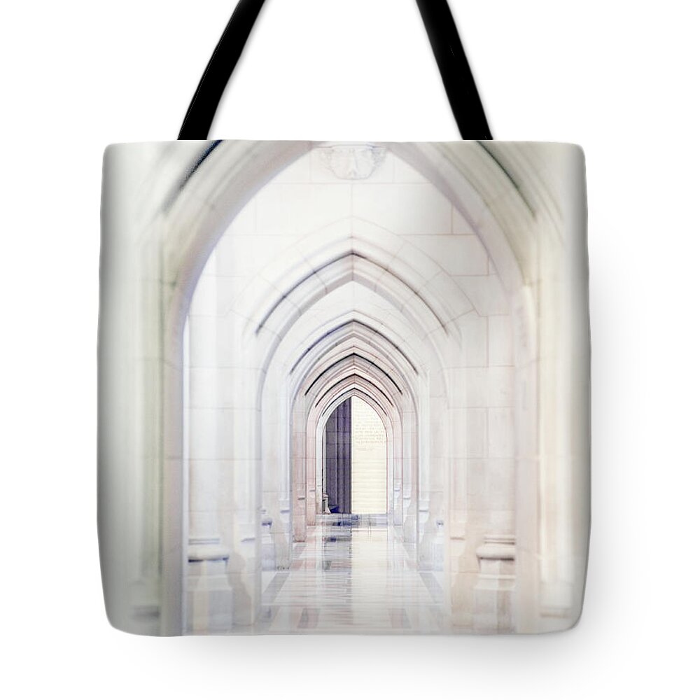 Arch Tote Bag featuring the photograph Long View Of Arches In A Church by Michael Duva