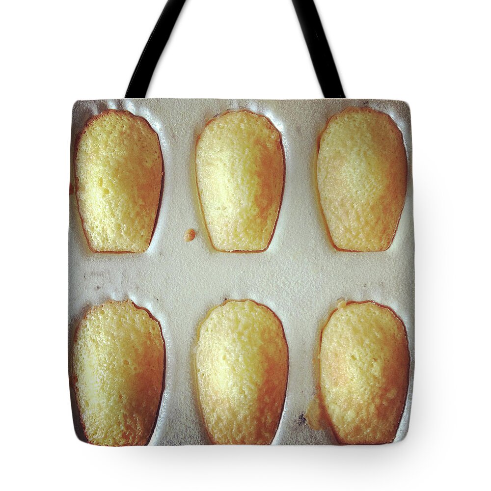 Madeleine Sponge Cake Tote Bag featuring the photograph Madeleines by Anshu Ajitsaria