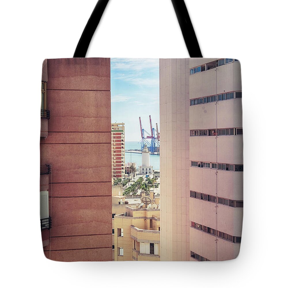 Street Tote Bag featuring the photograph Malaga port and light house by Ariadna De Raadt