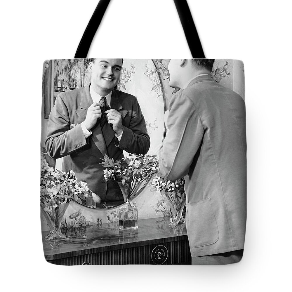 Three Quarter Length Tote Bag featuring the photograph Man Checking Himself Out In Mirror by George Marks