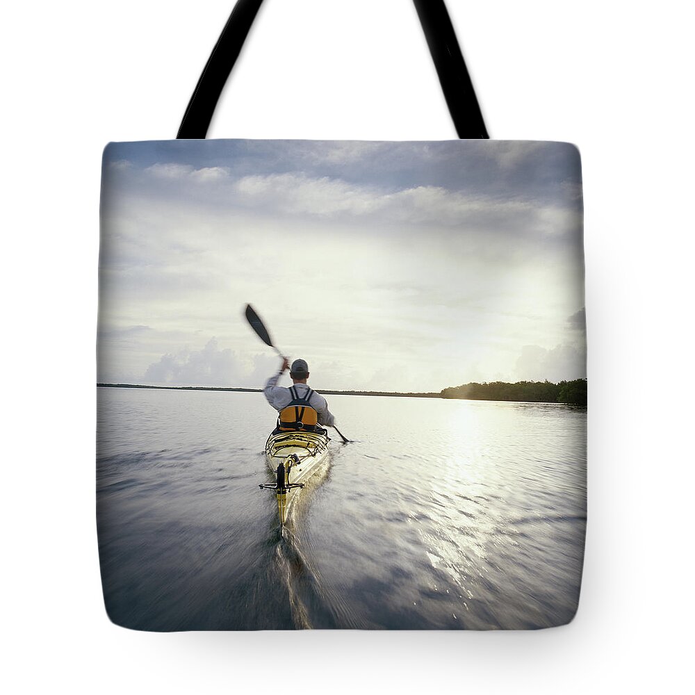 One Man Only Tote Bag featuring the photograph Man Kayaking, Rear View by Gary John Norman