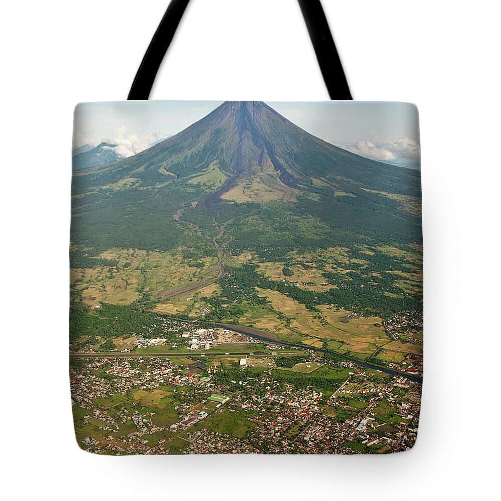 Dawn Tote Bag featuring the photograph Mayon Volcano And Legazpi City by Kay Dulay