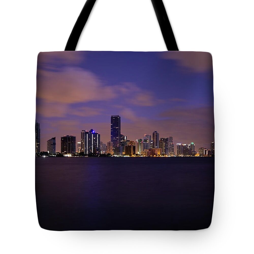 Water's Edge Tote Bag featuring the photograph Miami Skyline by Wsfurlan