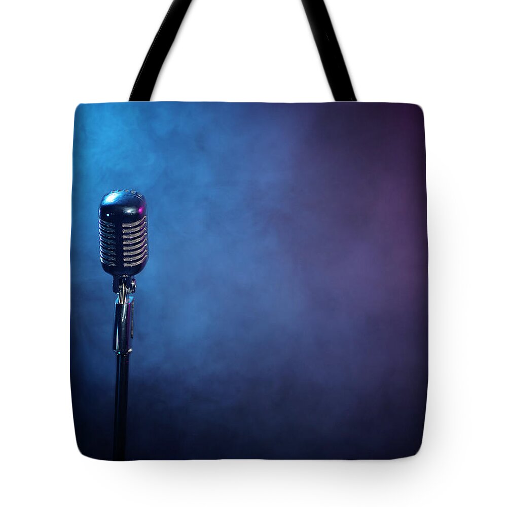 Microphone Stand Tote Bag featuring the photograph Microphone by Larnce Gold