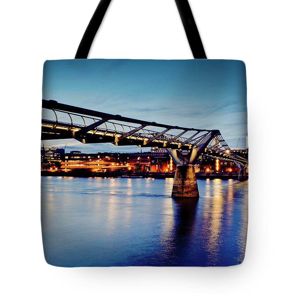 London Millennium Footbridge Tote Bag featuring the photograph Millennium Bridge Lit Up At Night by Cultura Exclusive/dan Dunkley
