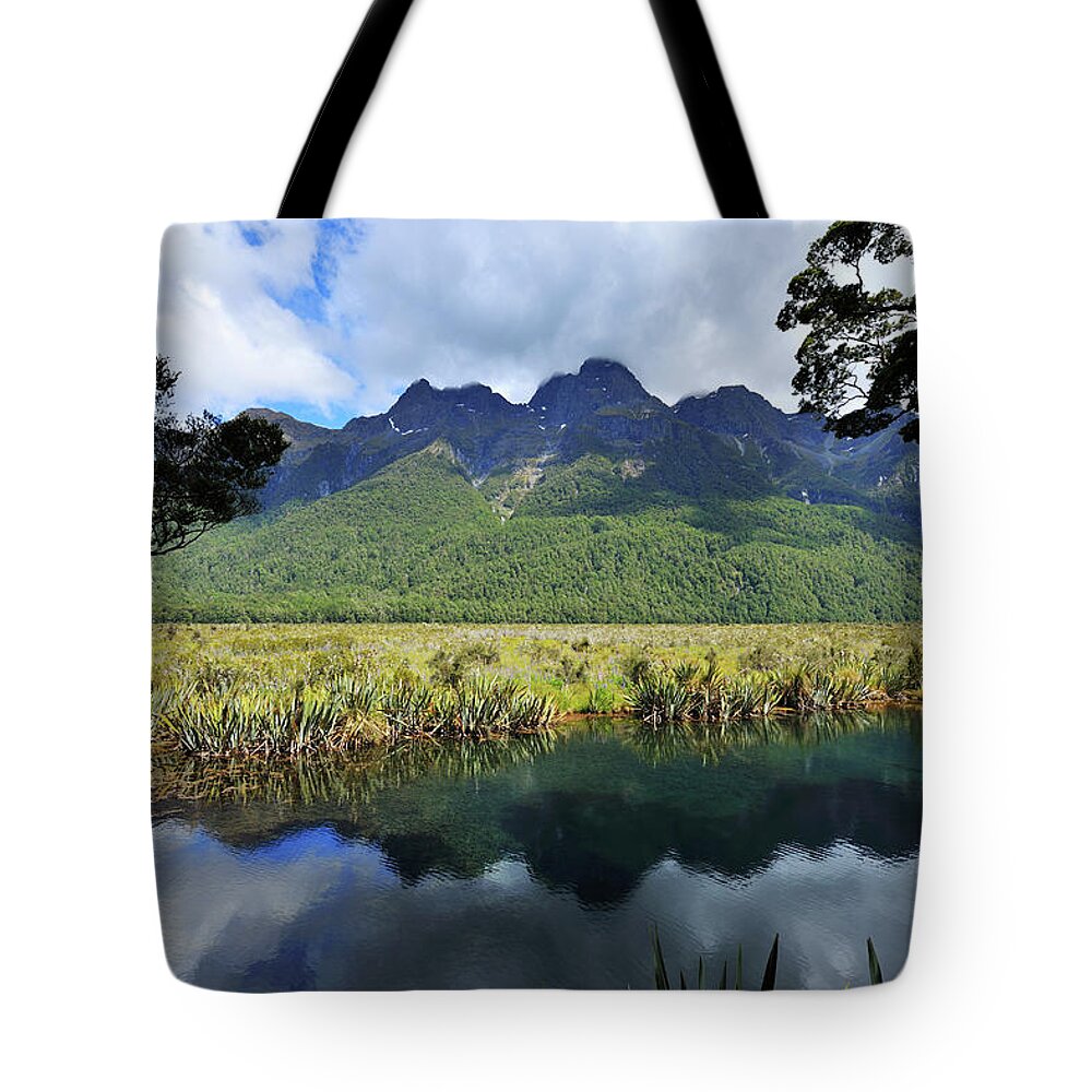 Scenics Tote Bag featuring the photograph Mirror Lakes by Raimund Linke