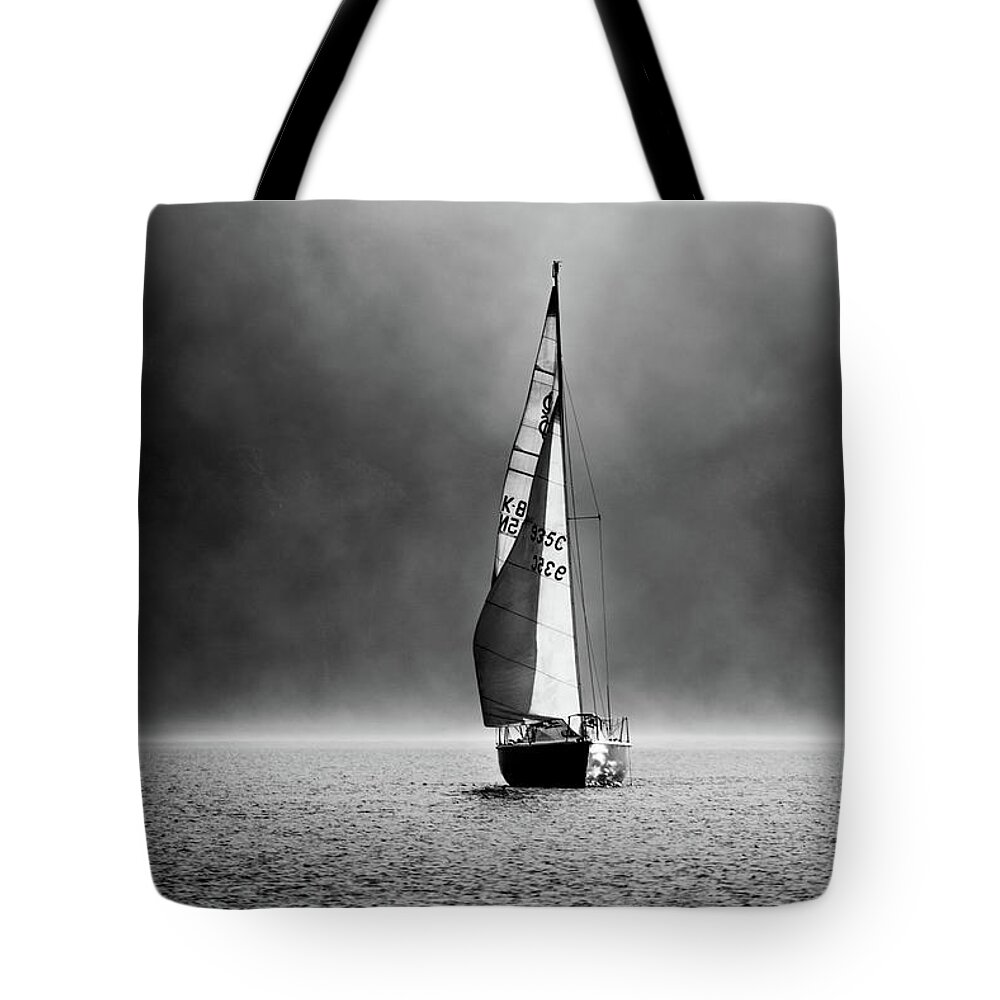 Mist Tote Bag featuring the photograph Mist rising and sail boat, Coniston Water - Portrait by Anita Nicholson