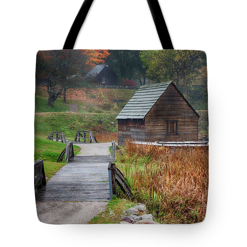 Autumn Foliage Massachusetts Tote Bag featuring the photograph misty morning at Saugus Ironworks by Jeff Folger