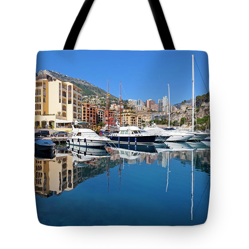 Water's Edge Tote Bag featuring the photograph Monaco Residential Yacht Marina by Pixzzle