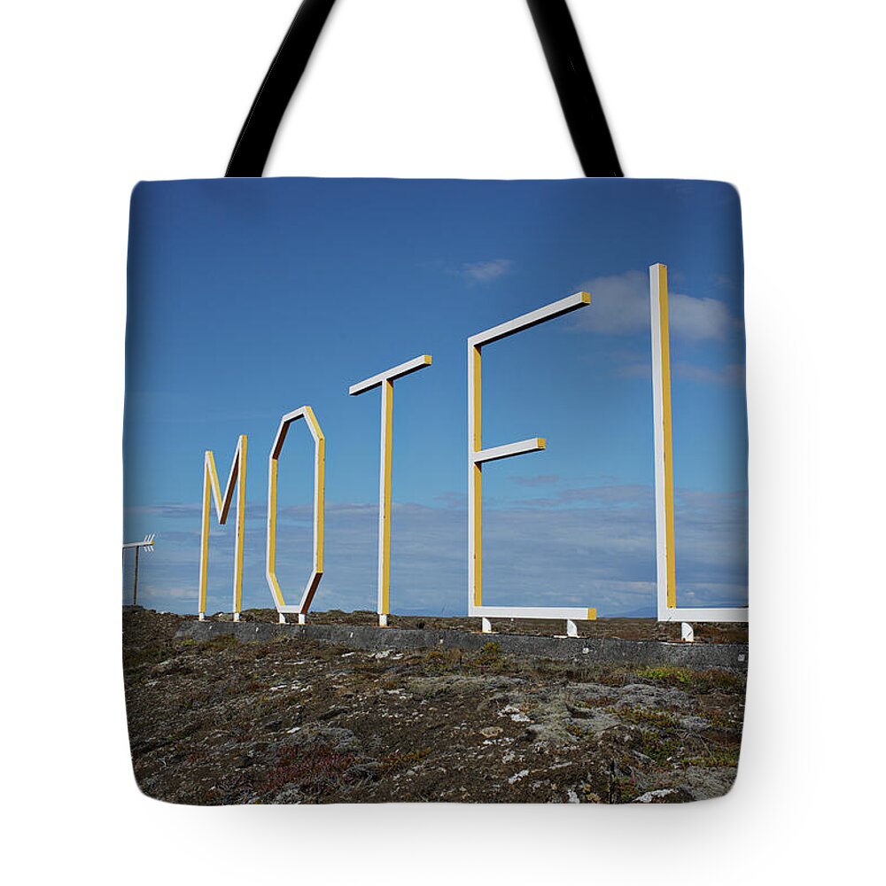 Tranquility Tote Bag featuring the photograph Motelsign In Lava Landscape With Blue by Klaus Vedfelt