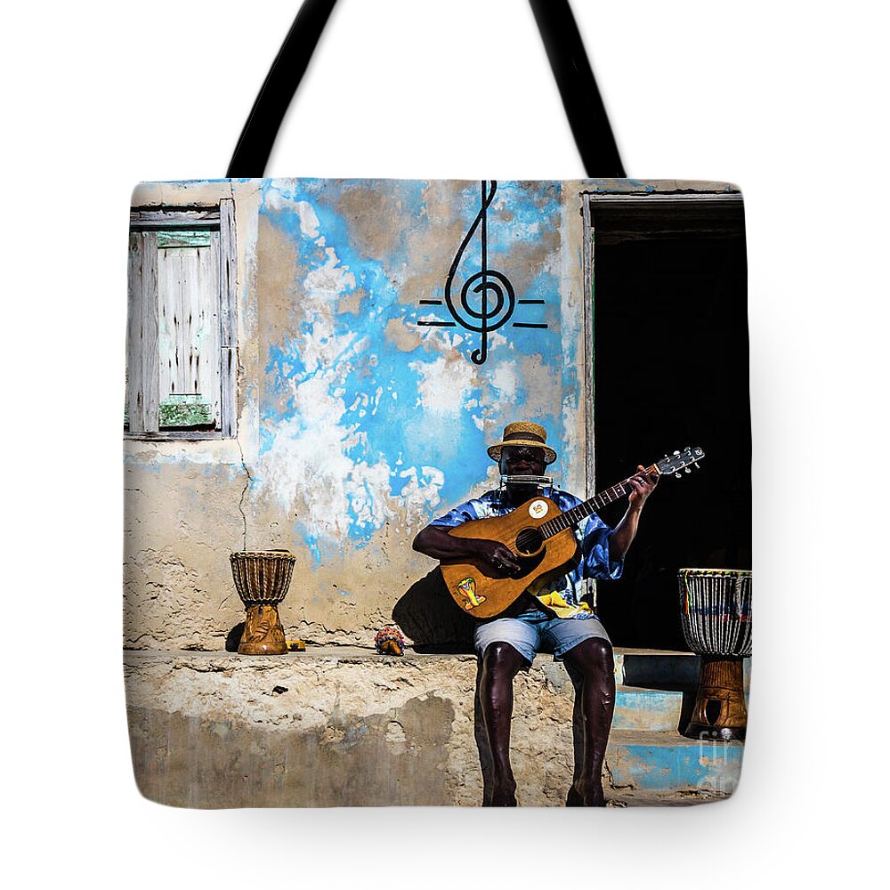 Musician Tote Bag featuring the photograph Music is the medicine of the mind by Lyl Dil Creations