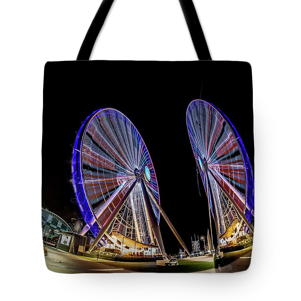 Chicago Tote Bag featuring the photograph New ferris wheel and its reflection by Sven Brogren