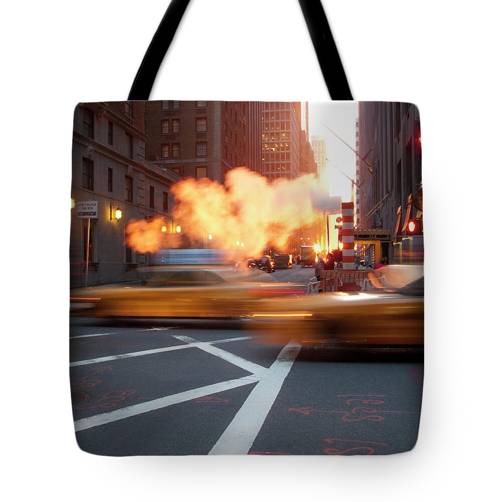 Blurred Motion Tote Bag featuring the photograph New York City Street Scene by Grant Faint