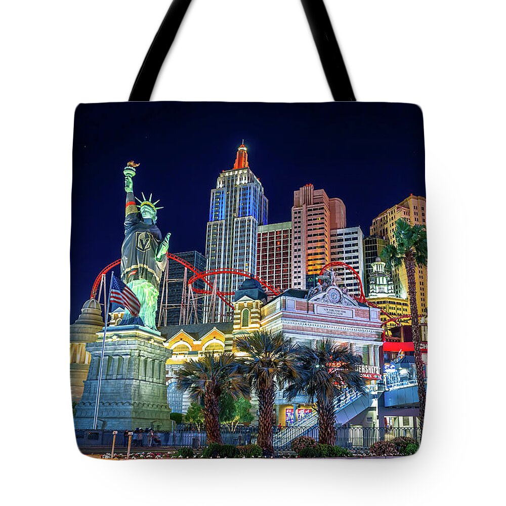 New York New York Casino Tote Bag featuring the photograph New York New York Casino at Dusk Low Angle Golden Knights by Aloha Art