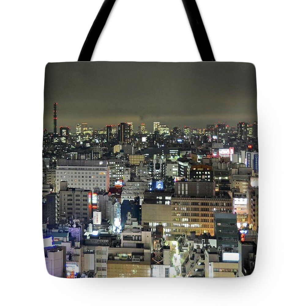 Outdoors Tote Bag featuring the photograph Night View Of Buildings And Neon Signs by Jake Jung