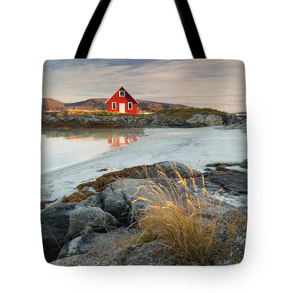 Water's Edge Tote Bag featuring the photograph Norwegian Rorbu by Antonyspencer