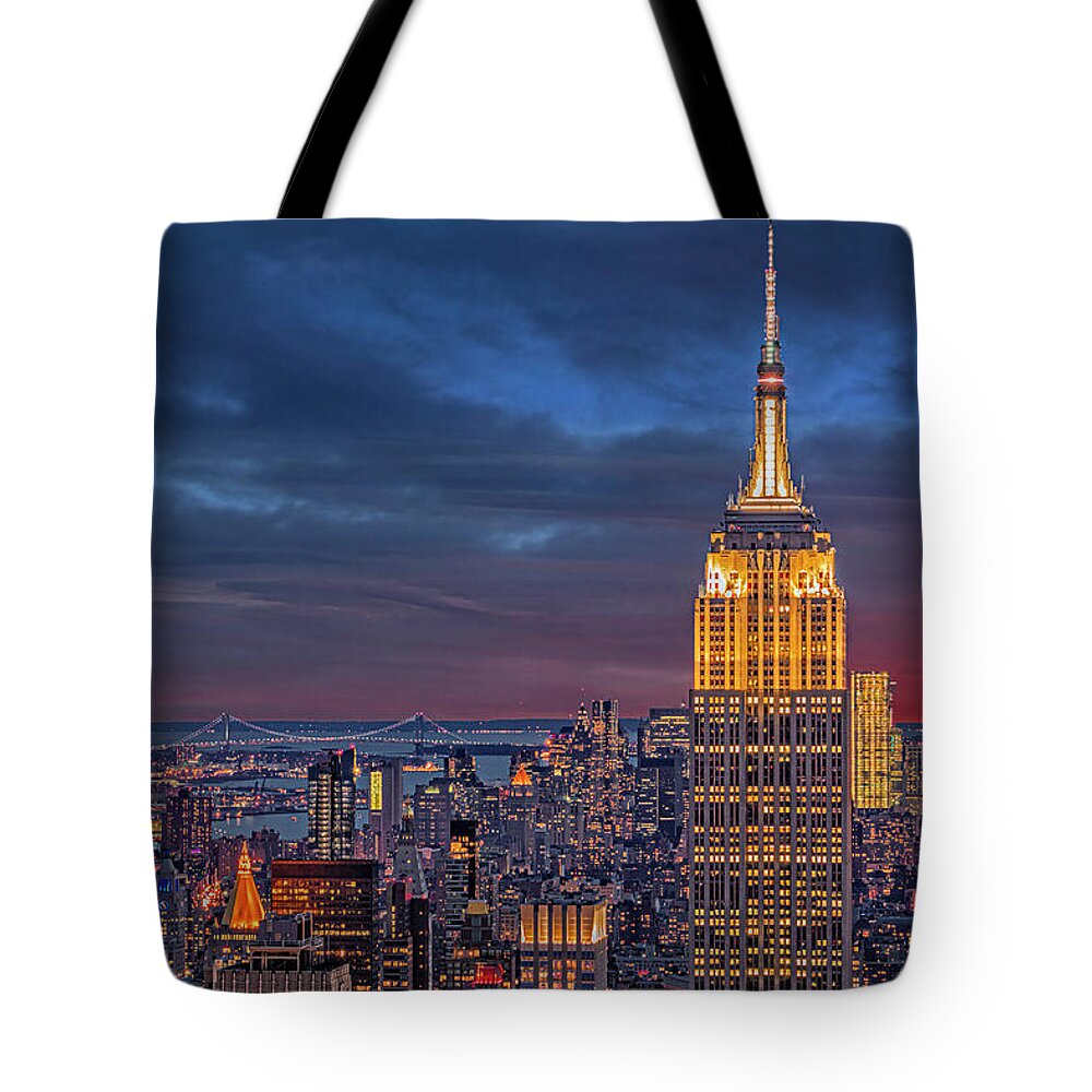 New York City Tote Bag featuring the photograph NYC ESB WTC Golden Hour by Susan Candelario