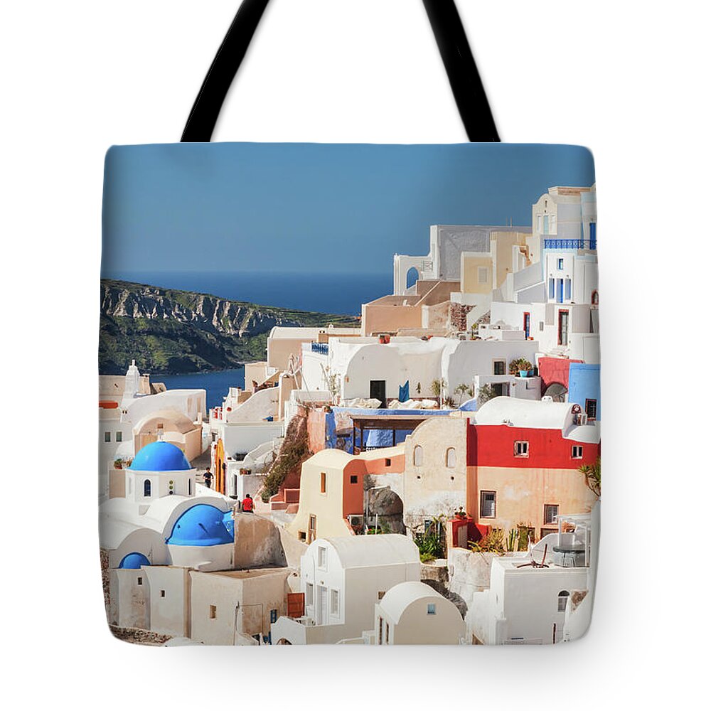 Tranquility Tote Bag featuring the photograph Oia Village, Santorini by Vasilis Tsikkinis Photos