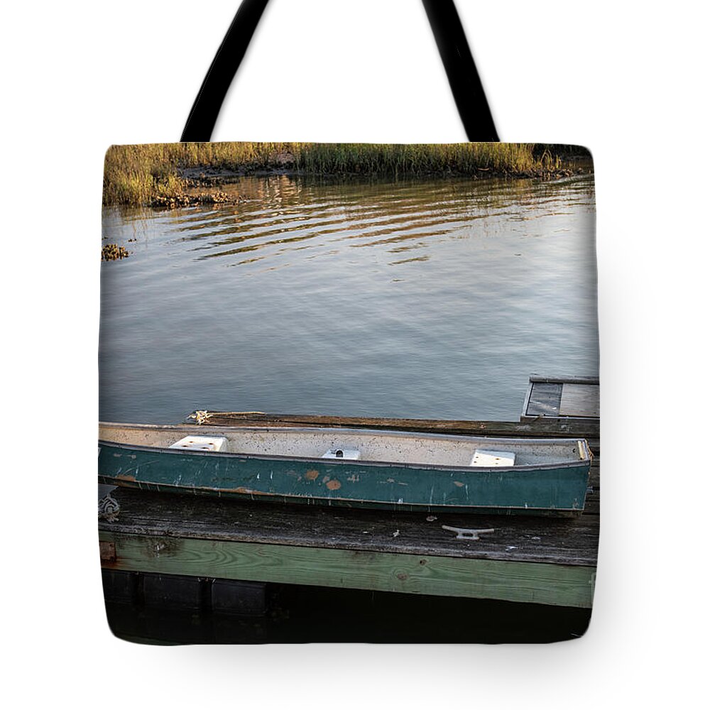 Canoe Tote Bag featuring the photograph Old Canoe on Dock in Shem Creek by Dale Powell