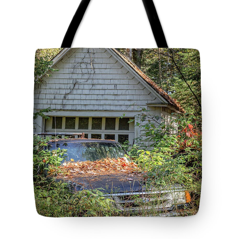 Vintage Tote Bag featuring the photograph Old Car in the Weeds by Edward Fielding