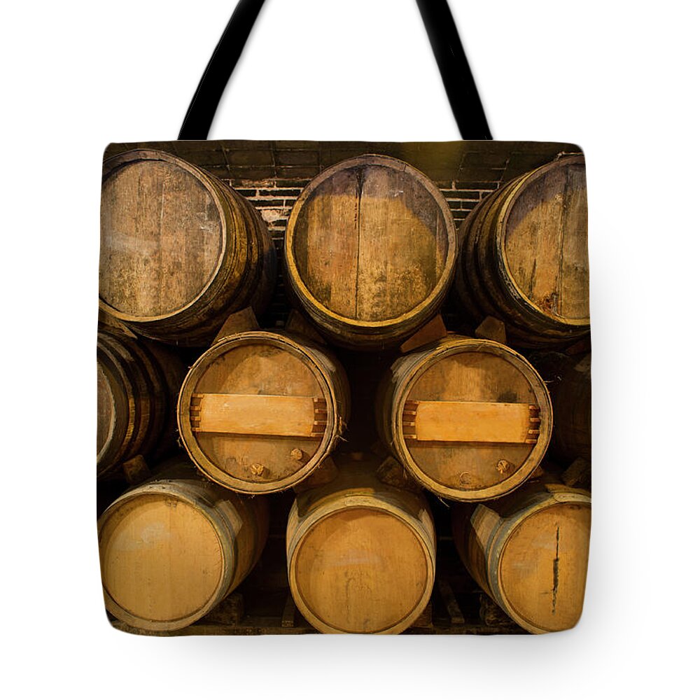 Alcohol Tote Bag featuring the photograph Old Cellar by Stockstudiox