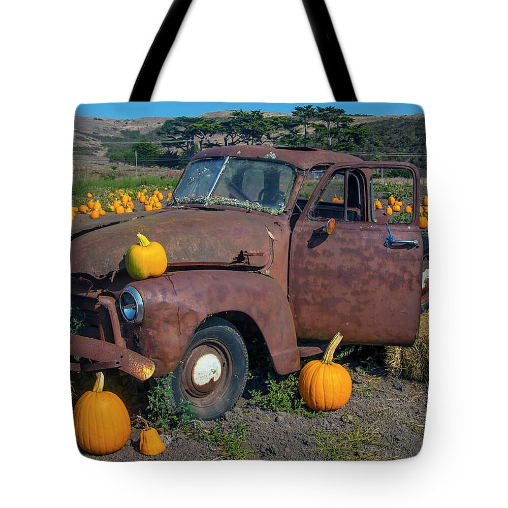 Truck Tote Bag featuring the photograph Old Rusting Truck In Pumpkin Patch by Garry Gay
