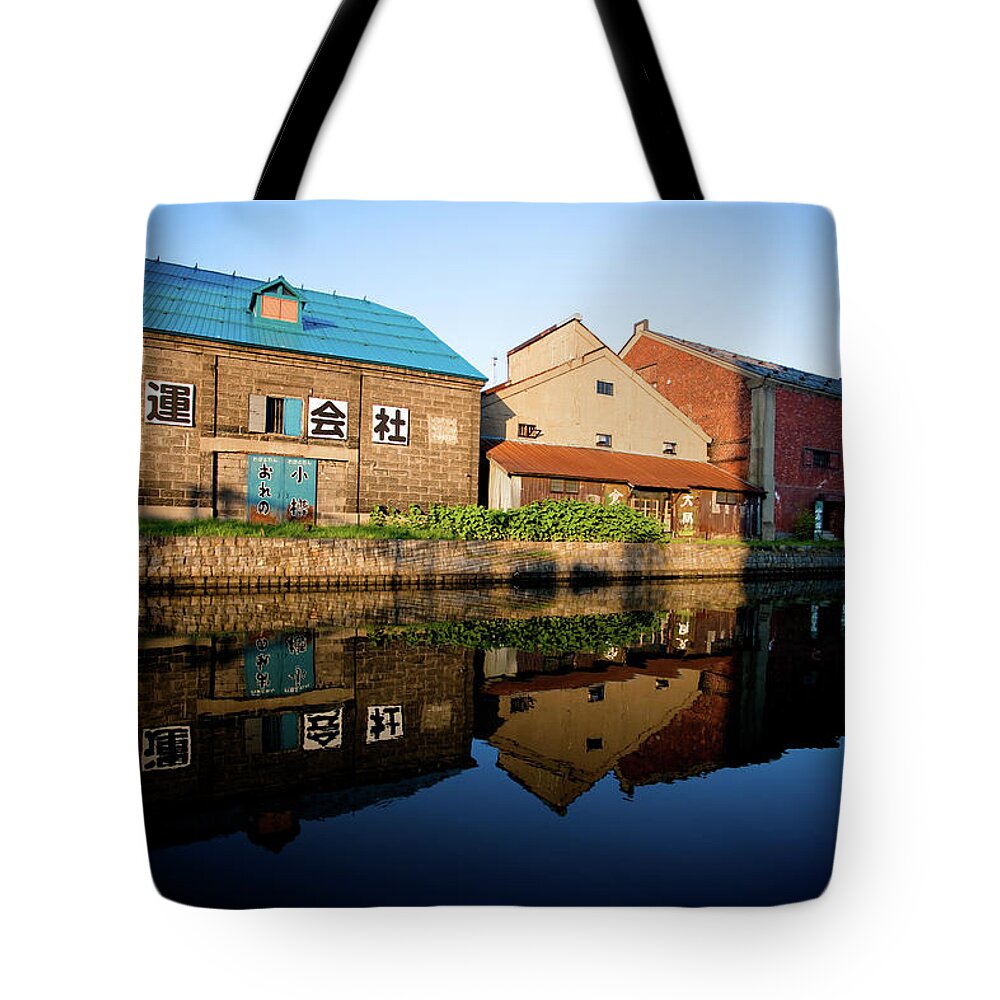 Hokkaido Tote Bag featuring the photograph Old Warehouses Reflection In Otaru Canal by Kelly Cheng Travel Photography