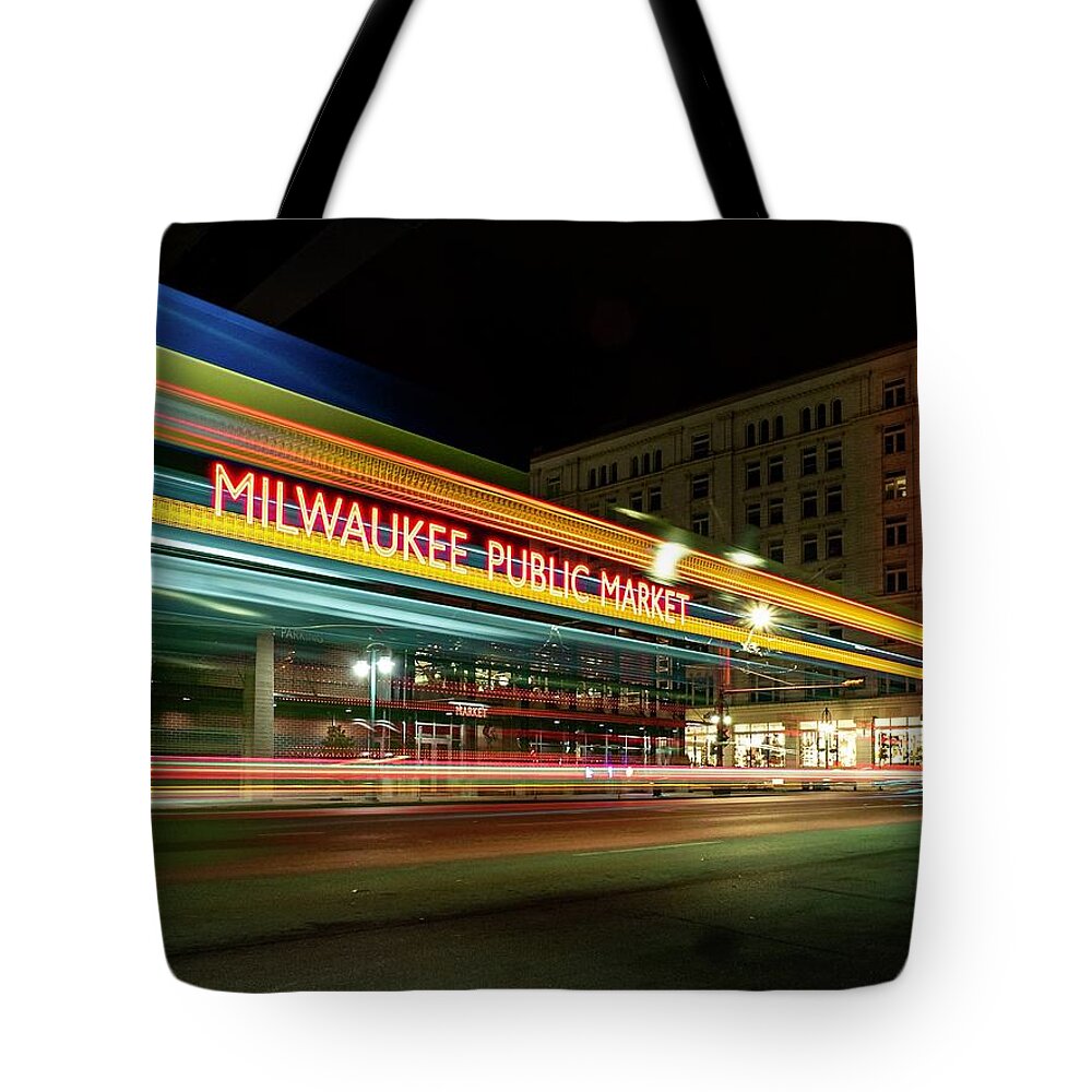 Milwaukee Public Market Tote Bag featuring the photograph On the Bus Route in the Third Ward by Kristine Hinrichs