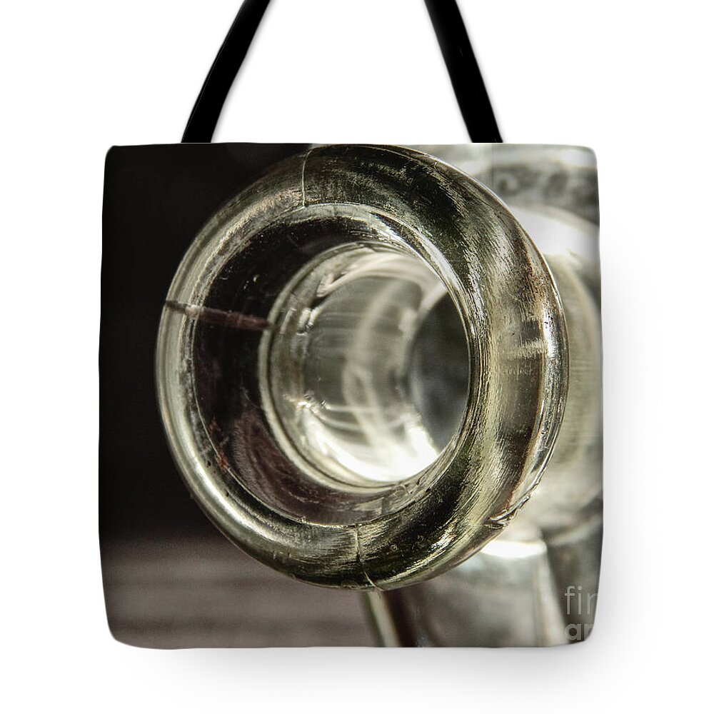 Glass Bottle Tote Bag featuring the photograph Opening of Glass Bottle by Phil Perkins
