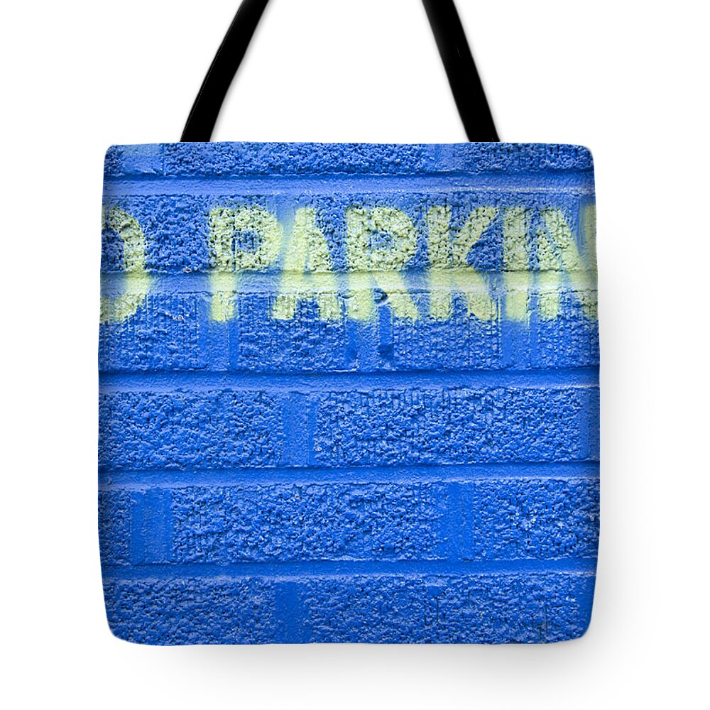 Built Structure Tote Bag featuring the photograph Painted Blue Brick Wall With No Parking by John Nordell