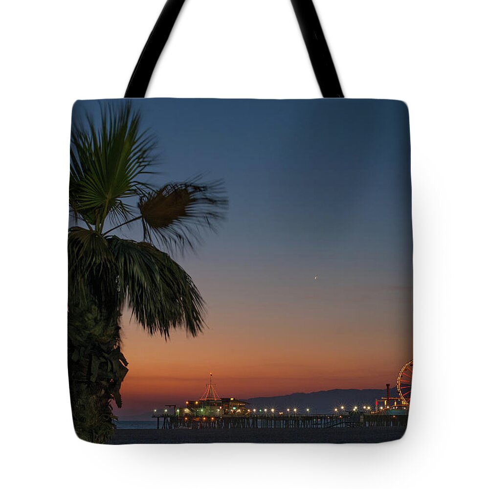 Tranquility Tote Bag featuring the photograph Palm Tree On Beach At Sunset by Cultura Rf/antonio Saba