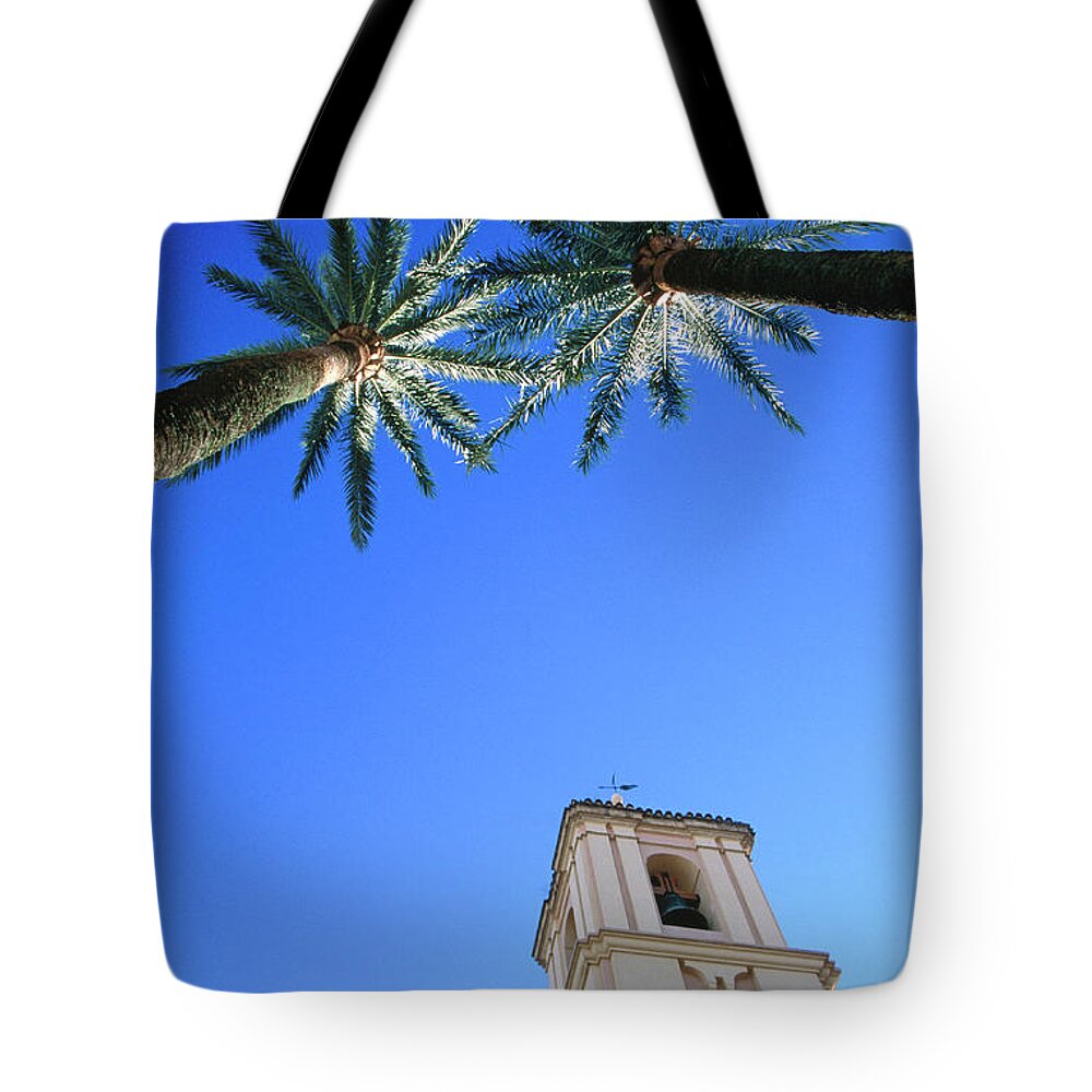 Outdoors Tote Bag featuring the photograph Palm Trees Framing Tower Of Iglesia De by Martin Llado