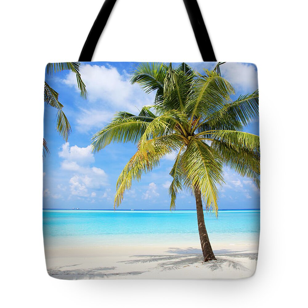 Scenics Tote Bag featuring the photograph Palm Trees On The Tropical Beach Of by Skynesher