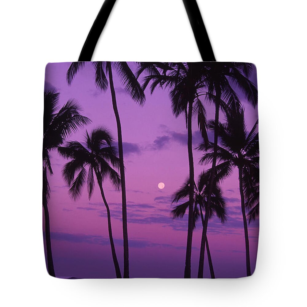 Tranquility Tote Bag featuring the photograph Palm Trees With Moon In A Bright Pink by Design Pics/ron Dahlquist