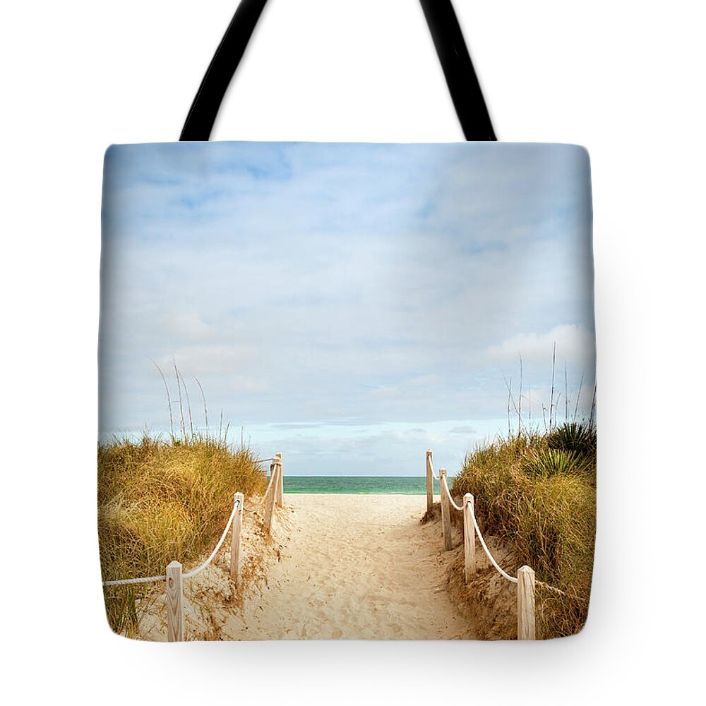 Water's Edge Tote Bag featuring the photograph Path To The Sandy Beach by Pgiam