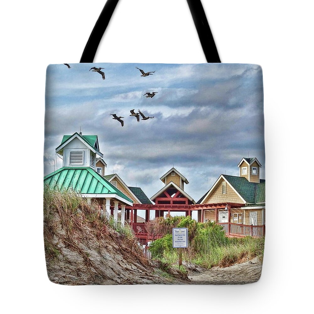 Beach Tote Bag featuring the photograph Pelicans over St. James Beach Club by Don Margulis