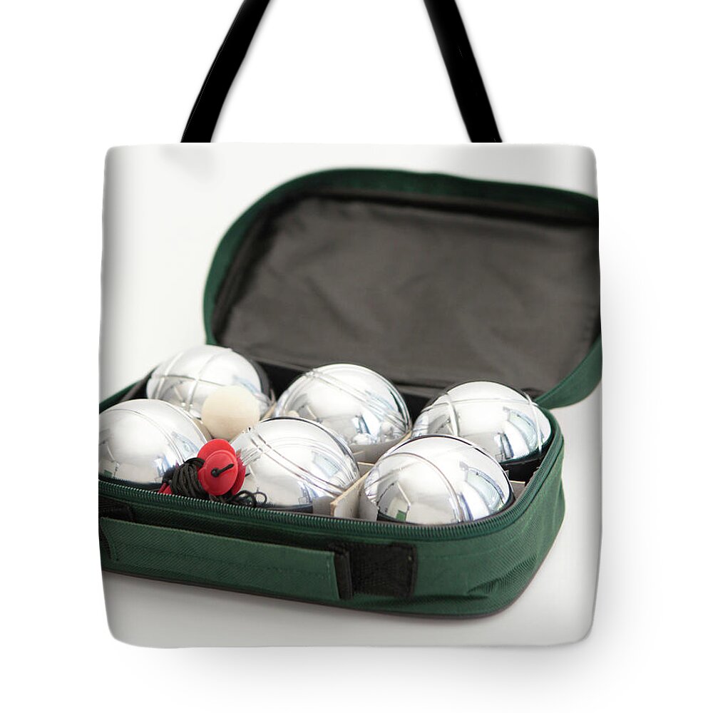 Ip_10318154 Tote Bag featuring the photograph Petanque Set Of Six Balls With Case On White Background by Jalag-fotostudio,