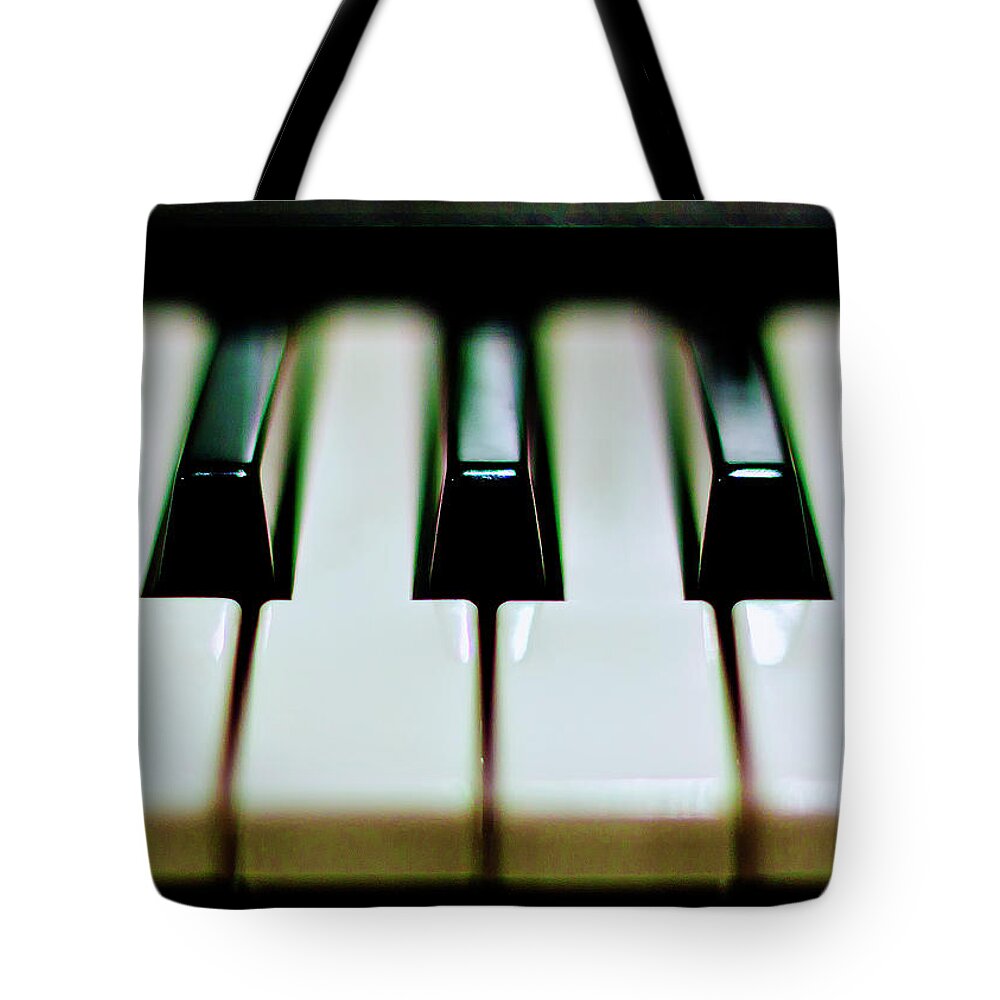 Black Color Tote Bag featuring the photograph Piano Keys by Calvert Byam