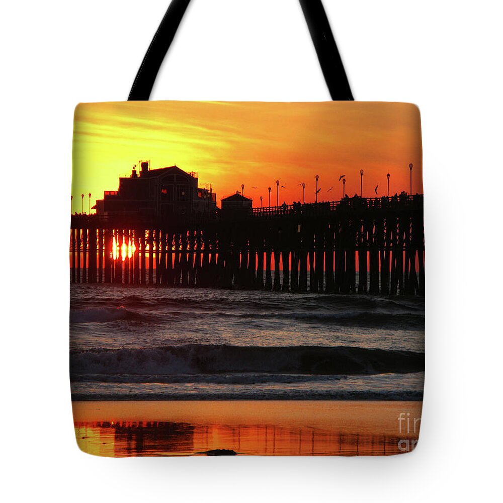 Pacific Ocean Tote Bag featuring the photograph Pier at Sunset by Terri Brewster