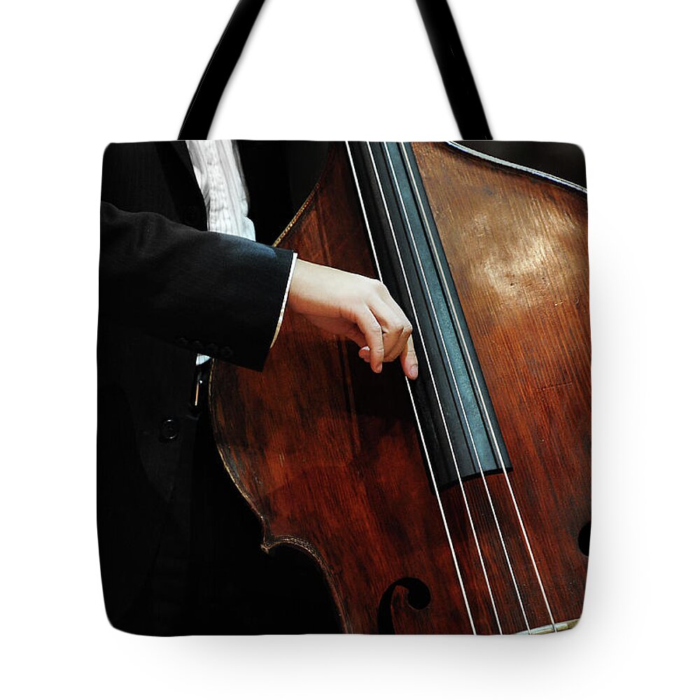 People Tote Bag featuring the photograph Playing Cello by Noam Galai / Noamgalai.com