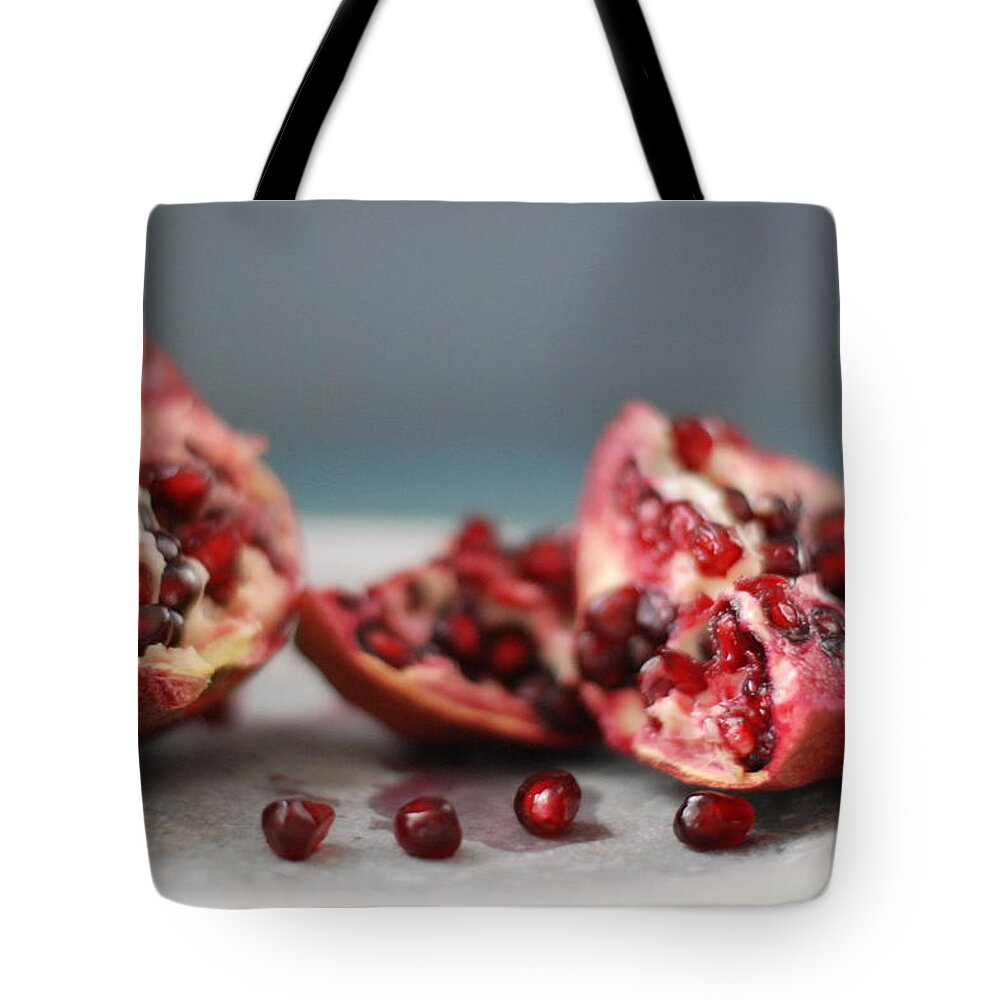Pomegranate Tote Bag featuring the photograph Pomegranates by Shawna Lemay
