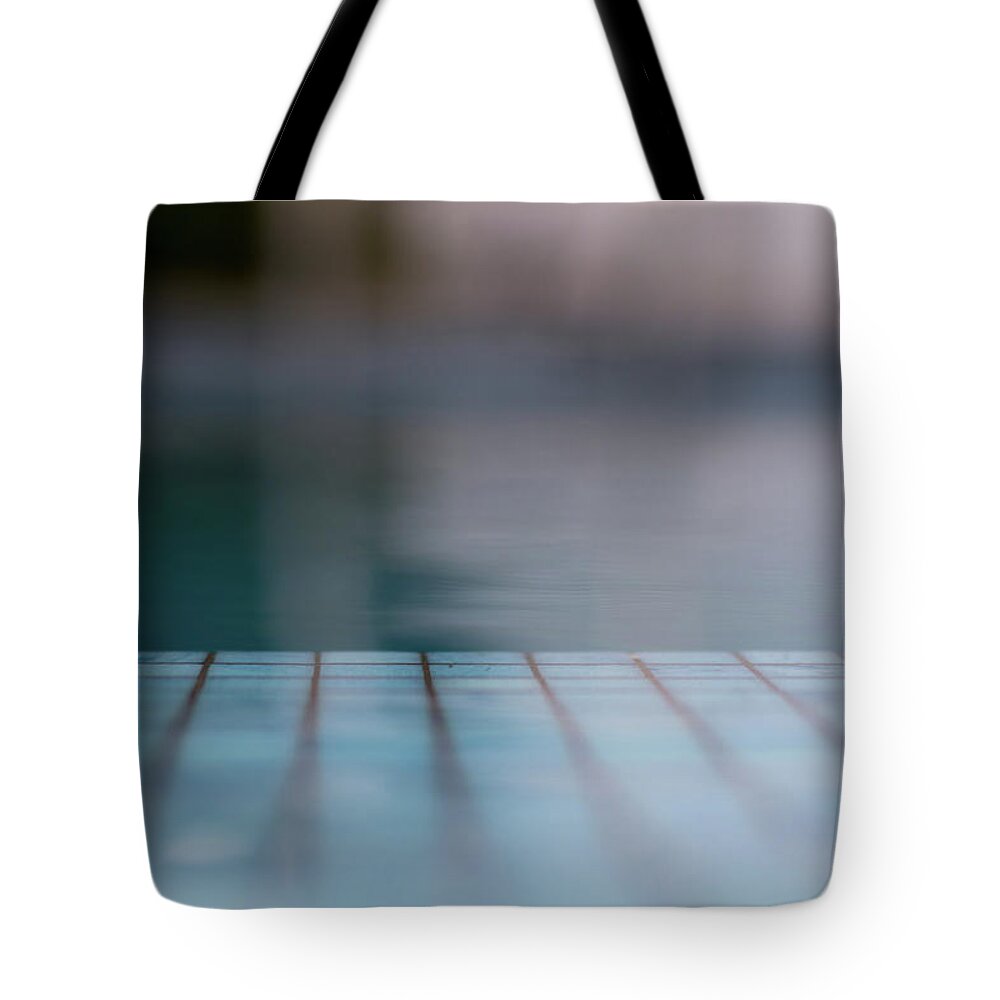 Blue Tote Bag featuring the photograph Pool And Stripes by Stelios Kleanthous
